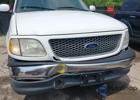 2000 Ford F150 из США, поврежденный, VIN 1FTRX17L6YNB57586